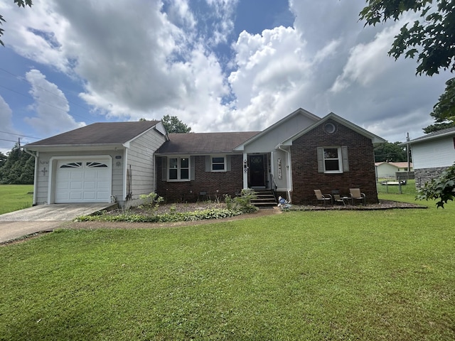 217 Millcreek Dr, Loretto, TN 38469 - ranch-style house with driveway, an attached garage, brick siding, and a front lawn
