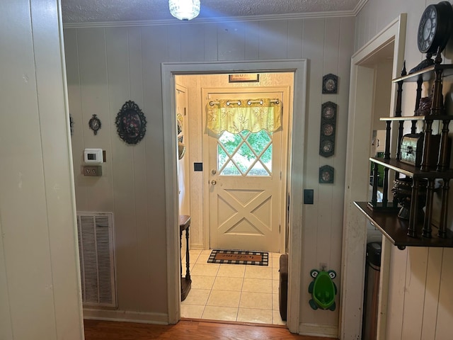 217 Millcreek Dr, Loretto, TN 38469 - foyer entrance featuring ornamental molding and wood finished floors