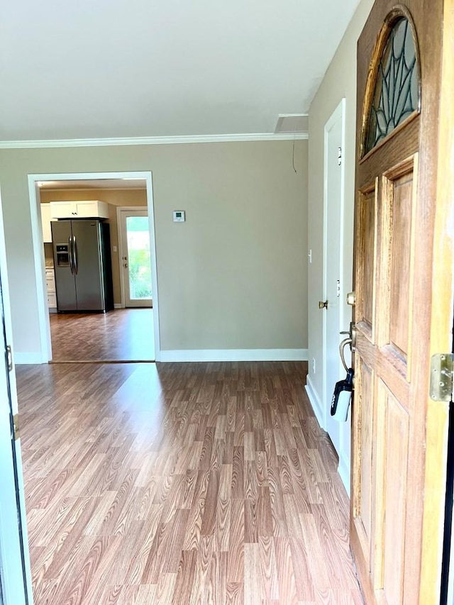 210 Roney Dr, Hopkinsville, KY 42240 - spare room featuring attic access, wood finished floors, and ornamental molding