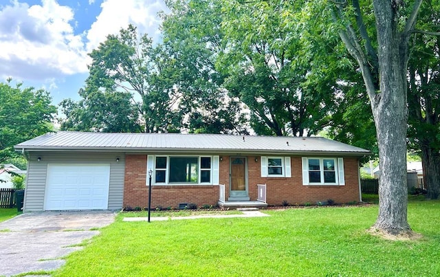 210 Roney Dr, Hopkinsville, KY 42240 - ranch-style home featuring a garage, asphalt driveway, brick siding, and a metal roof