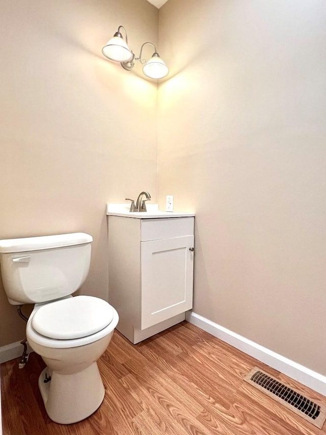 210 Roney Dr, Hopkinsville, KY 42240 - half bathroom with vanity and wood finished floors