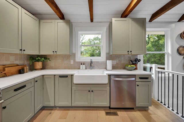 8014 Shoals Branch Rd, Primm Springs, TN 38476 - kitchen with dishwasher, beamed ceiling, tasteful backsplash, light countertops, and light wood-style flooring