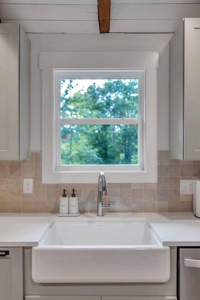 8014 Shoals Branch Rd, Primm Springs, TN 38476 - kitchen with dishwasher, light countertops, decorative backsplash, and plenty of natural light