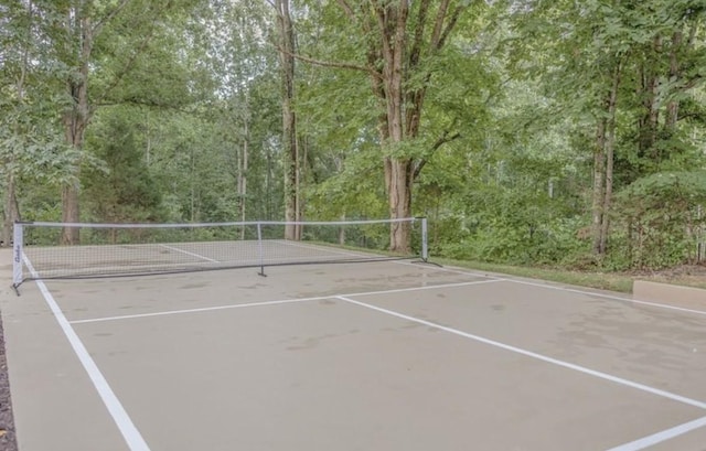8014 Shoals Branch Rd, Primm Springs, TN 38476 - view of tennis court with a view of trees