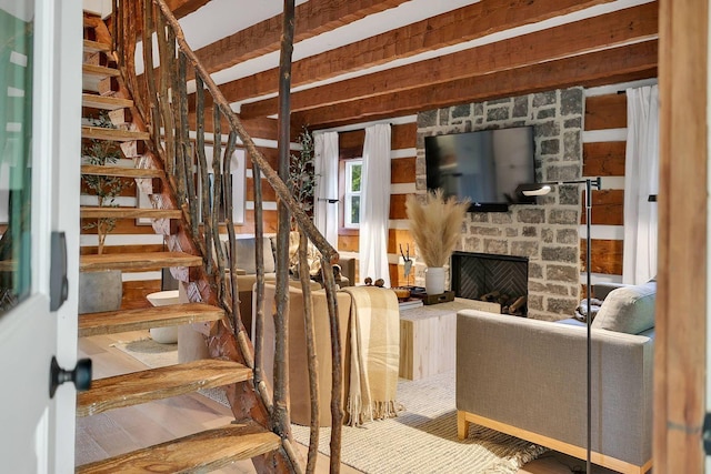 8014 Shoals Branch Rd, Primm Springs, TN 38476 - stairway with a stone fireplace