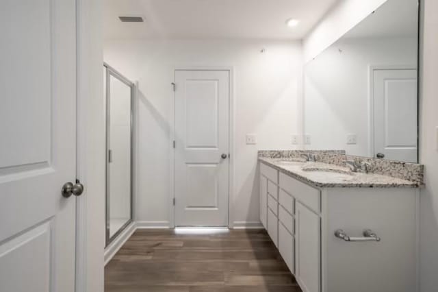 3380 Tucker Trce, Columbia, TN 38401 - bathroom featuring wood finished floors and double vanity