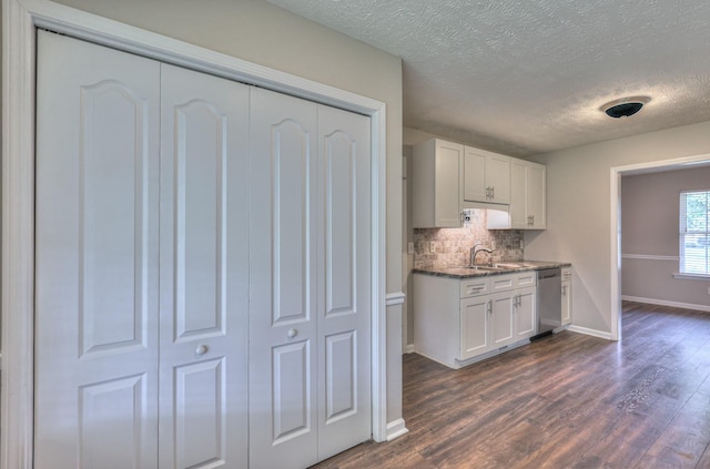 212 Towbridge Dr, Murfreesboro, TN 37129 - kitchen featuring dishwasher, decorative backsplash, a textured ceiling, dark wood-type flooring, and white cabinetry