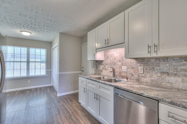 212 Towbridge Dr, Murfreesboro, TN 37129 - kitchen featuring stainless steel dishwasher, a textured ceiling, backsplash, dark wood-style floors, and white cabinetry
