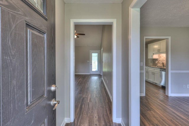 212 Towbridge Dr, Murfreesboro, TN 37129 - hallway featuring dark wood-style floors and a textured ceiling