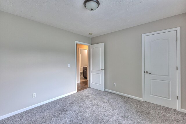 212 Towbridge Dr, Murfreesboro, TN 37129 - unfurnished bedroom with carpet floors and a textured ceiling