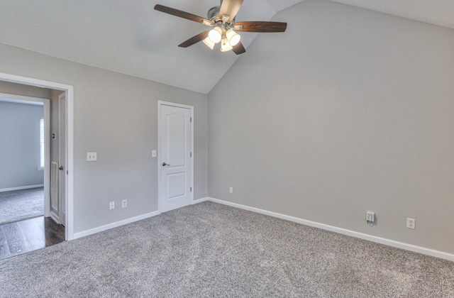 212 Towbridge Dr, Murfreesboro, TN 37129 - unfurnished bedroom featuring dark carpet, lofted ceiling, and ceiling fan