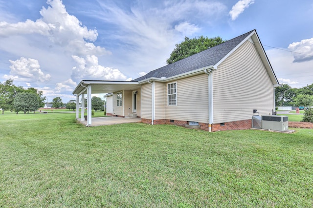 212 Towbridge Dr, Murfreesboro, TN 37129 - rear view of house featuring crawl space, a lawn, a patio area, and roof with shingles