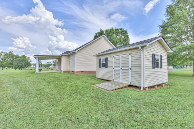 212 Towbridge Dr, Murfreesboro, TN 37129 - rear view of house with a lawn and a storage shed