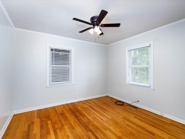 1905 Highland Ave, Columbia, TN 38401 - unfurnished room with ornamental molding, wood finished floors, and ceiling fan
