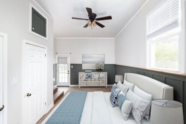 1905 Highland Ave, Columbia, TN 38401 - bedroom with multiple windows, crown molding, wainscoting, and ceiling fan