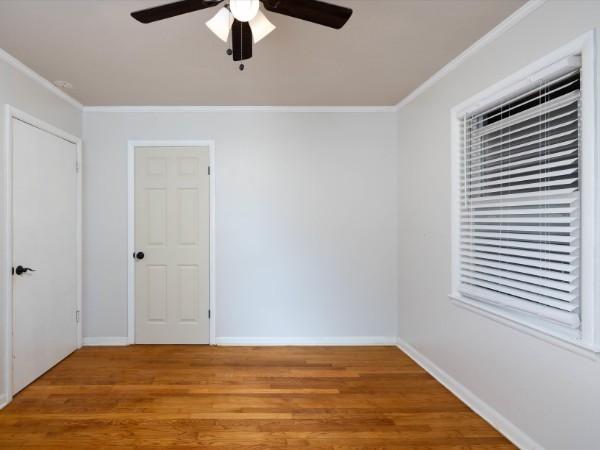 1905 Highland Ave, Columbia, TN 38401 - unfurnished room with ceiling fan, ornamental molding, and light wood finished floors