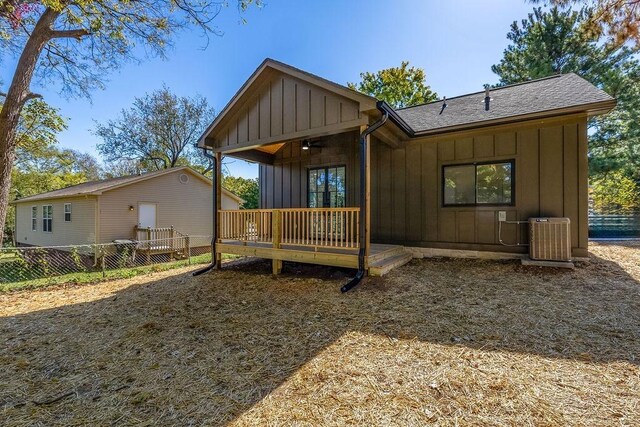1905 Highland Ave, Columbia, TN 38401 - rear view of house featuring board and batten siding, a wooden deck, and a shingled roof