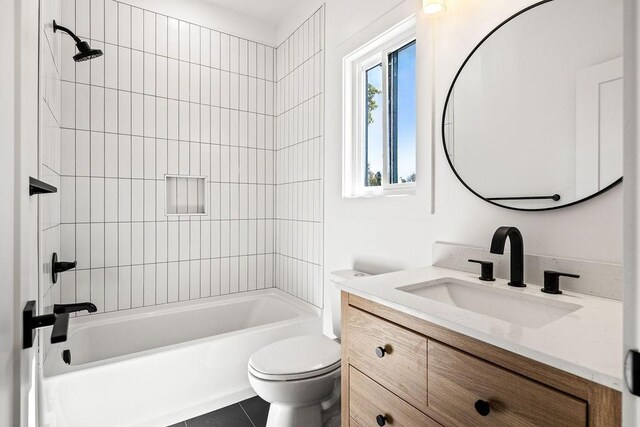 1905 Highland Ave, Columbia, TN 38401 - full bath featuring vanity, washtub / shower combination, and tile patterned flooring