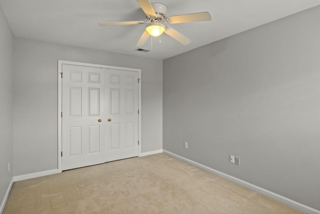 231 Green Harbor Rd Unit 59, Old Hickory, TN 37138 - unfurnished bedroom featuring carpet, a closet, and ceiling fan
