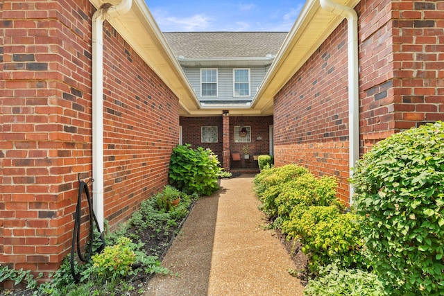 231 Green Harbor Rd Unit 59, Old Hickory, TN 37138 - view of exterior entry featuring brick siding and roof with shingles