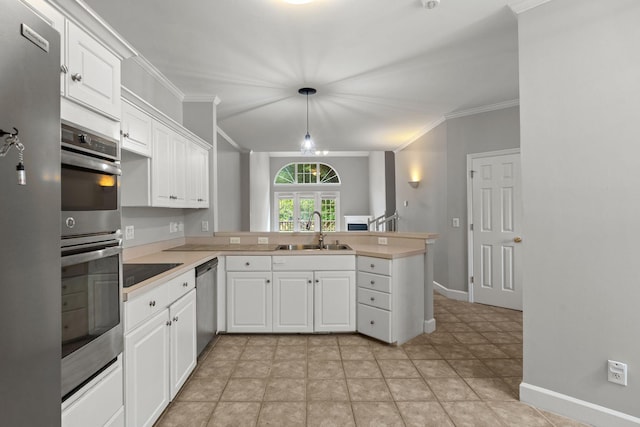 231 Green Harbor Rd Unit 59, Old Hickory, TN 37138 - kitchen with a peninsula, stainless steel appliances, ornamental molding, white cabinetry, and light countertops