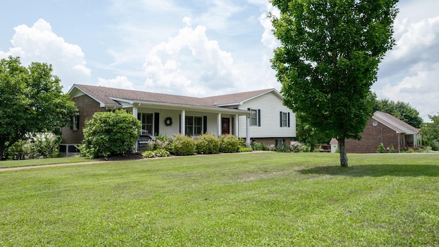 1335 Chippendale Cir, Columbia, TN 38401 - view of front of property with a front lawn, covered porch, and brick siding