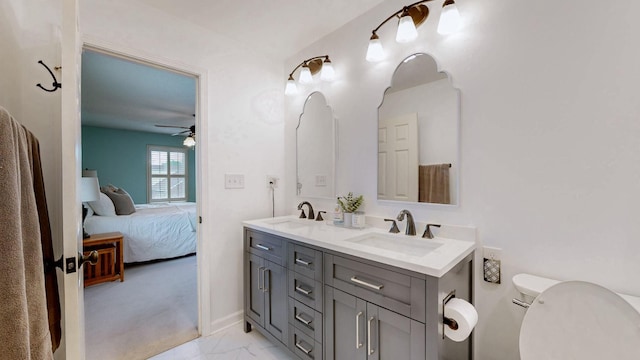 1335 Chippendale Cir, Columbia, TN 38401 - bathroom featuring double vanity, connected bathroom, marble finish floors, and a ceiling fan