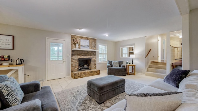 1335 Chippendale Cir, Columbia, TN 38401 - living area with stairway and a fireplace