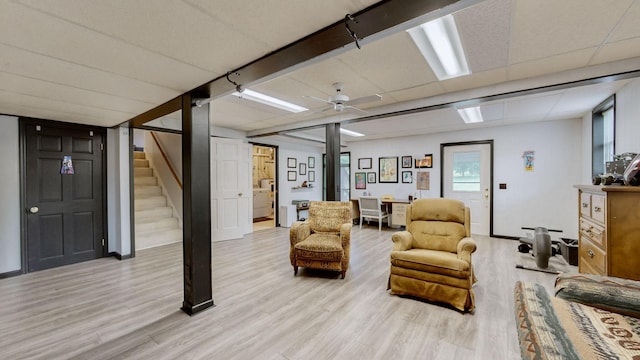 1335 Chippendale Cir, Columbia, TN 38401 - living area with wood finished floors, stairs, a ceiling fan, and washer / clothes dryer