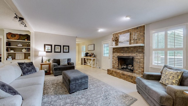 1335 Chippendale Cir, Columbia, TN 38401 - carpeted living room with a fireplace