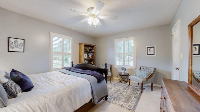 1335 Chippendale Cir, Columbia, TN 38401 - bedroom with multiple windows, light carpet, a textured ceiling, and a ceiling fan