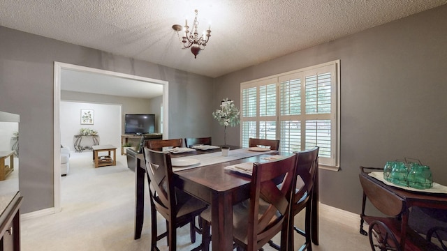 1335 Chippendale Cir, Columbia, TN 38401 - dining space featuring light colored carpet, a chandelier, and a textured ceiling
