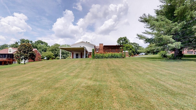 1335 Chippendale Cir, Columbia, TN 38401 - view of green lawn with a carport