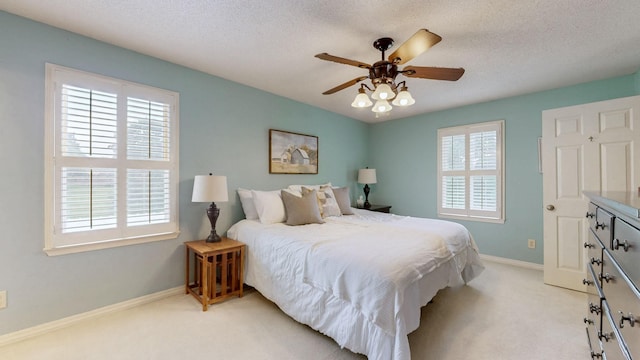 1335 Chippendale Cir, Columbia, TN 38401 - bedroom with light carpet, a textured ceiling, and a ceiling fan