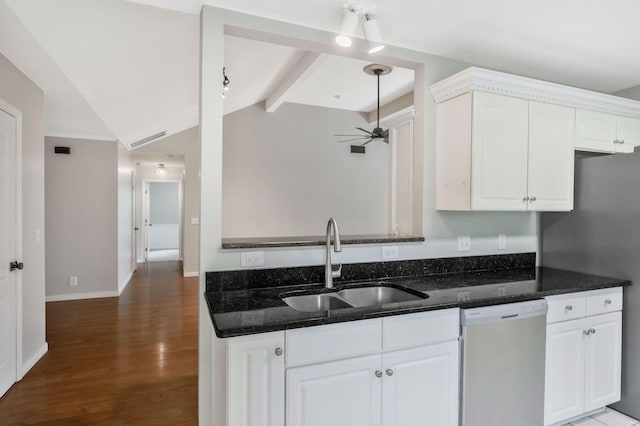 2910 Churchill Ln, Thompsons Station, TN 37179 - kitchen featuring dishwasher, dark stone counters, a ceiling fan, wood finished floors, and white cabinetry