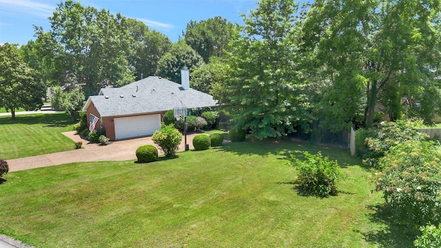 2910 Churchill Ln, Thompsons Station, TN 37179 - view of front of property with a garage, concrete driveway, a front yard, a chimney, and brick siding