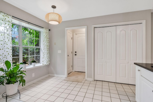 2910 Churchill Ln, Thompsons Station, TN 37179 - unfurnished dining area featuring plenty of natural light and light tile patterned floors