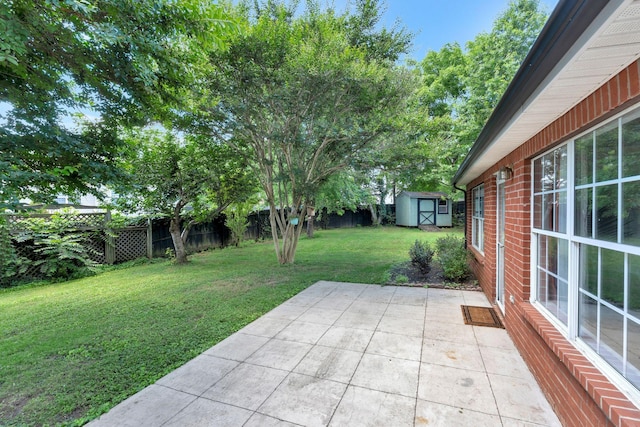 2910 Churchill Ln, Thompsons Station, TN 37179 - fenced backyard featuring a storage shed and a patio area