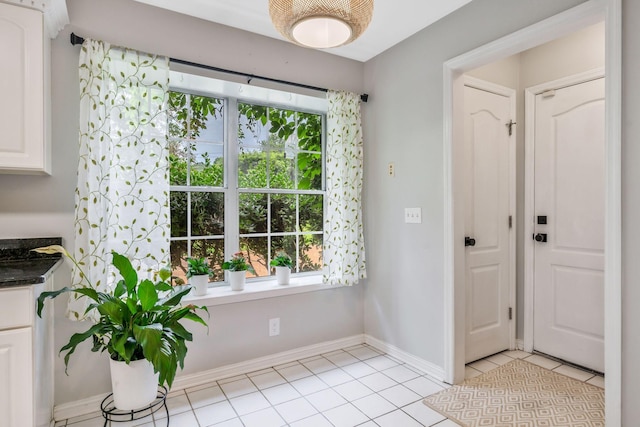 2910 Churchill Ln, Thompsons Station, TN 37179 - foyer with light tile patterned floors and baseboards