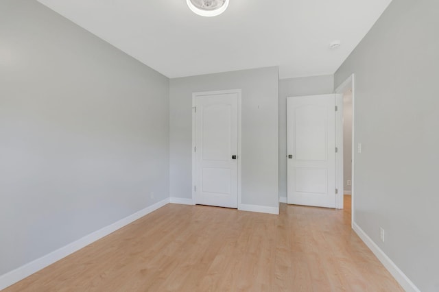 2910 Churchill Ln, Thompsons Station, TN 37179 - unfurnished bedroom featuring light wood-style flooring and baseboards