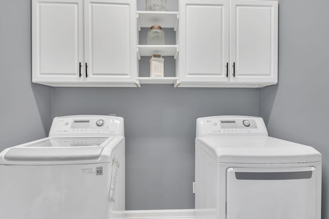 2600 Little Bartons Creek Rd, Cumberland Furnace, TN 37051 - laundry area with washing machine and clothes dryer and cabinet space