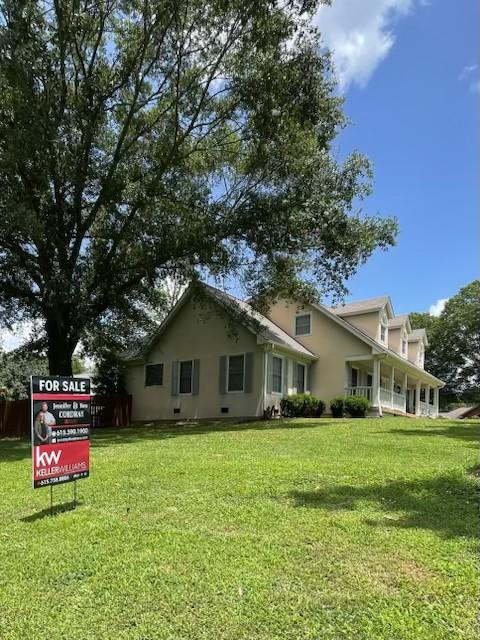 110 Applewood Valley Dr, Hendersonville, TN 37075 - view of property exterior featuring a lawn and stucco siding
