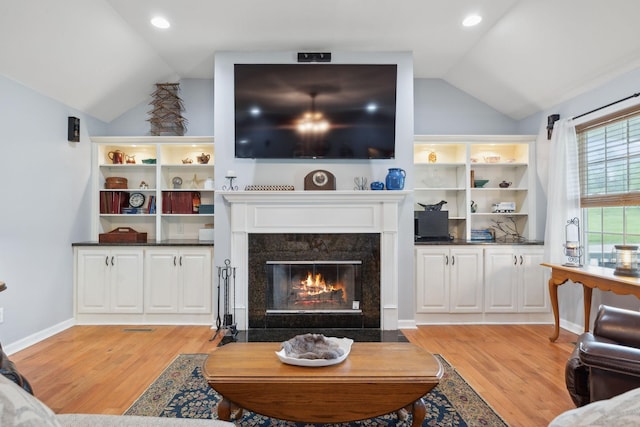 1550 Beech Bottom Rd, Watertown, TN 37184 - living room with lofted ceiling, light wood-style floors, a high end fireplace, and recessed lighting