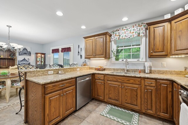 1550 Beech Bottom Rd, Watertown, TN 37184 - kitchen with stainless steel dishwasher, a chandelier, a peninsula, brown cabinets, and healthy amount of natural light