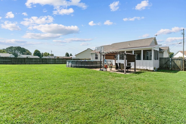 1620 Baucom Dr, Columbia, TN 38401 - fenced backyard featuring a sunroom, a patio, and a gate