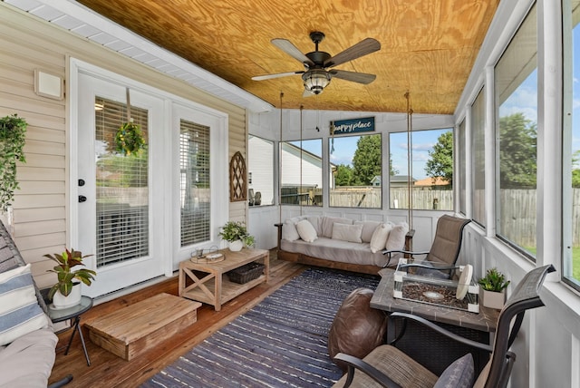 1620 Baucom Dr, Columbia, TN 38401 - sunroom / solarium featuring ceiling fan and an outdoor living space with a fire pit