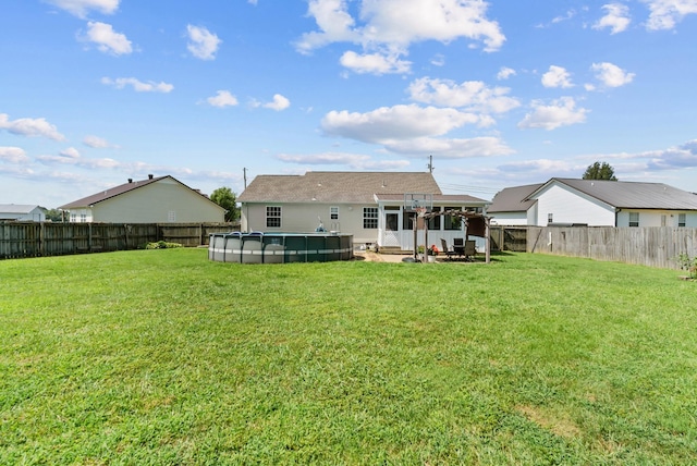 1620 Baucom Dr, Columbia, TN 38401 - rear view of house with a fenced backyard and a sunroom