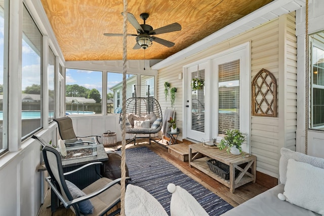 1620 Baucom Dr, Columbia, TN 38401 - sunroom / solarium with ceiling fan and an outdoor living space with a fire pit
