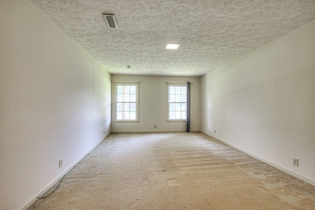 2010 Hartland Rd, Franklin, TN 37069 - unfurnished room featuring light colored carpet and a textured ceiling