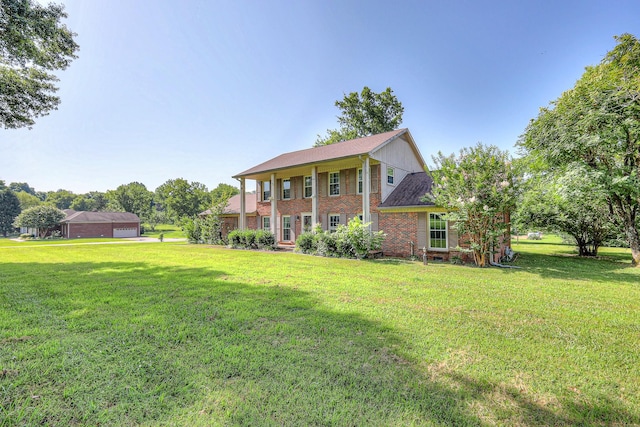 2010 Hartland Rd, Franklin, TN 37069 - view of front of property with a front lawn, brick siding, and a garage